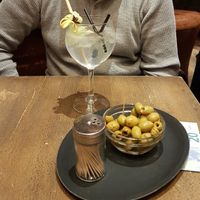 Gin tonic and olives at Le Cercle Des Voyageurs in Brussels