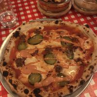 Cheeseburger pizza, meatballs and Mac and cheese  at Young Vegans Pizza Shop in London