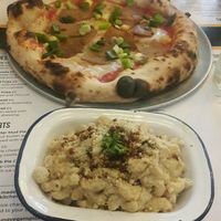 Pineapple pizza and mac n cheese at Young Vegans Pizza Shop in London