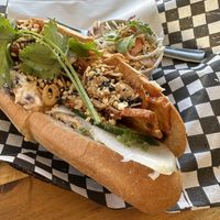 Gochujang Tofu & Mushroom Banh Mi with Side Slaw  at Rustle & Still in Toronto