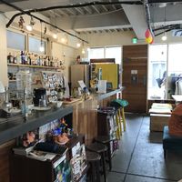 Bar and kitchen + tables where meals are eaten! at Guesthouse Fete in Tokyo