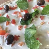 Vegan labnah manousha!  at Raha Natureland in Kuwait City