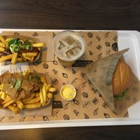poutine (wouldn’t recommend), kebab fries, juice, veganizer burger ! at VINCENT - East Side Mall in Berlin