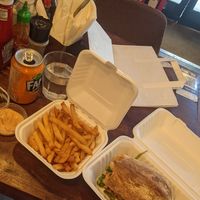 large vegan tempeh sandwich and salted chips with vegan mayo at Social Board in Brighton