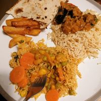 Biryani, Masala chips, pilau rice and aubergine curry at Cafe Indus in Sheffield