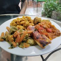Buffet selection of the day: Tofu stir-fry, chickpea potato curry, falafel, flauta, and Spanish-style eggplant at Rey Sol in Guatemala City