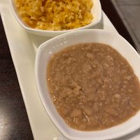 Delicious refried pinto beans and rice!  at Madre Tierra in Upland