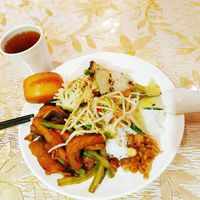 Eggplants, different kind tofu, long beans, cauliflowers, Soy sprouts, pickles, rice, cake, tea. All for 18 ¥ at Good Vegetarian in Shenzhen