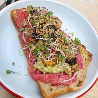 Smashed avocado toast with beet root hummus (10.5€) at Bohemian Kids Café in Leipzig
