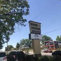 Exterior sign at Green Papaya in Fort Smith