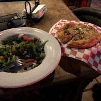 Vegan pizza and salad at Mezzaluna in Loreto