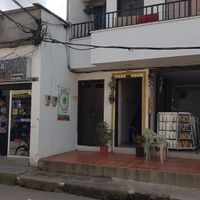 Their sign is on the wall, but it's the second doorway to the right. at Hojarasca Cultura Organica in El Carmen De Viboral