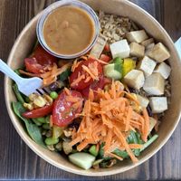 Create your own bowl with tofu and evil peanut dressing on the side  at The Chopped Leaf in Brandon