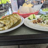 Plant-based burrito. The tacos were potato and grilled onions taco was delicious Love her salsa! at Adriana's in Cottonwood