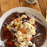 The protein pancakes are vegan and arrive smothered in a nut-butters 😋  at Karma Cafe in Palolem