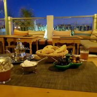 Mint tea and complimentary olives and bread at Koulchi Zine in Marrakech