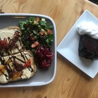 Lunchtime treat - country bumpkin- hummus, roasted veg with balsamic dressing on warm bread with fresh mixed salad & beetroot slaw followed by warm chocolate fudge cake & cream  at Caffè No 3 @ Home in Durham