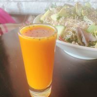 shot de cúrcuma piña y cayena at Tasty Beet in Chihuahua