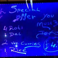 A Ronak offer/menu/window sign at Ronak in East London