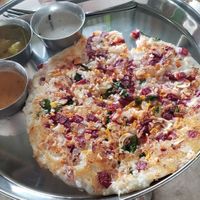 The best uthapan I've ever had! Cashews, moringa leaves, beets, coconut. Yum! at Holy Rabbit in Varkala