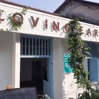 At first it looks like going to a gallery. The restarant itself is behind. at Loving Earth Cafe in Fort Kochi