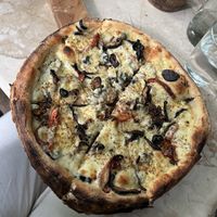White truffle pizza   at Loving Earth Cafe in Fort Kochi
