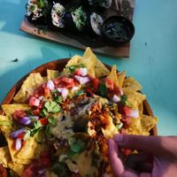 Sushi & cheesy nachos to share - sooo good at Loving Earth Cafe in Fort Kochi