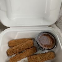 Mozzarella sticks with sauce at Strong Hearts in Syracuse