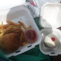 Vegan burger, sweet potato fries and cupcake at Strong Hearts in Syracuse
