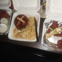 Vegan chicken wings, beyond meat burger on pretzel bun and chips at Strong Hearts in Syracuse