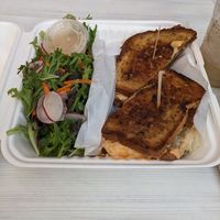 The Reuben with side of greens at Strong Hearts in Syracuse