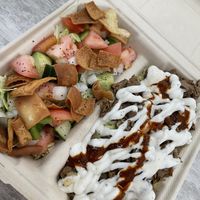 Oz box with Beyond Steak on rice with salad (dressing held)!   at Osmow's Modern Mediterranean in Niagara Falls