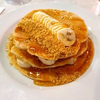 Vegan pancakes with crushed digestive, banana and maple syrup at POG - Tara St in Dublin