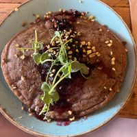 Vegan banana pancakes with berry compote  at Clean Bean in Durham