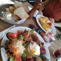 Vegan breakfast and bread (non vegan in background) at Strandcafé in Frankfurt