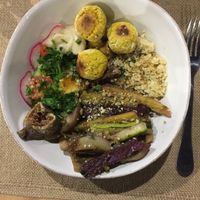 Delicious vegan falafel bowl with couscous and veggies.  at Bosque Bio in Almada