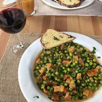 Traditional Portuguese dish ervilhas com ovos escalfados e chouriço minus the egg and all vegan! So yummy!  at Bosque Bio in Almada