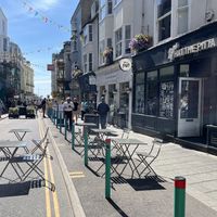 The sea is at the end of the road a few steps away. You could take away to eat at the beach!  at What The Pitta in Brighton