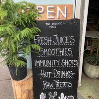 Sign for cafe  at The Organic Press in Toronto