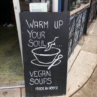 Sign for cafe at The Organic Press in Toronto
