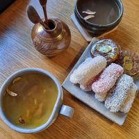 Traditional treat plate with citrus and ginger teas at Traditional Tea House Insadong (전통 찻집 인사동) in Seoul