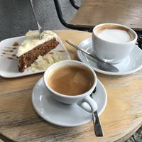 Carrot cake, espresso and flat white with oat milk  at Orange Coffee in Berlin