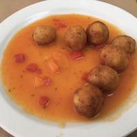 Semolina gnocchi with carrot and red bell pepper sauce at La Riera in Barcelona