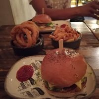 THIS burgers, massive onion rings , and skin on fries at HUB St Ives in St Ives