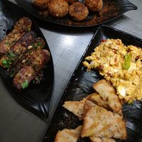 Tempeh, cheese balls and cheese dip with bread. at Tarantula in Thessaloniki