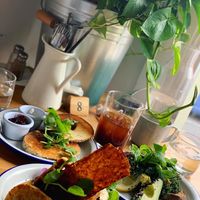 Left: Bagel with Cream Cheese & Jam - Centre: Waffle Stack - Right: Tofu Scramble at Flora by Greenhouse Canteen in West End