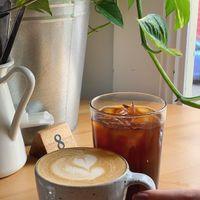 Front: Dirty Chai with Oat Milk - Back: Iced Long Black at Flora by Greenhouse Canteen in West End