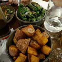 Pimientos del padrón (top), patatas bravas (bottom) at EDO in Belfast