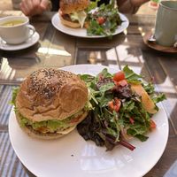 Quinoa burger and beyond meat burger with salad   at Kula in Pisac