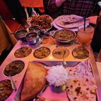 Vegan tali onion basin and aubergine curry. The green dip in the trio is NOT vegan at Indian Lounge in Nice